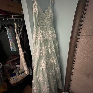 Mint green lace over dress.